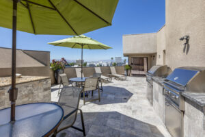 6afb2910860b17ac92786aaf5768c678 An apartment with a patio featuring a bbq grill and umbrella for rent. The Ivy Apartments in Sherman Oaks 15301 Valley Vista Blvd Sherman Oaks, CA 91403  P: 844-678-0903 TTY: 711 F: 818-647-0264